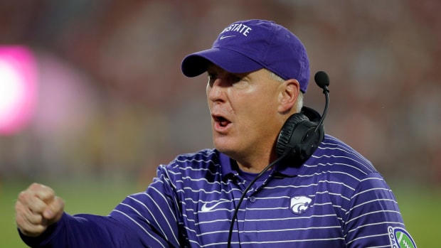 Kansas State head coach Chris Klieman celebrates after a Kansas State touchdown during a college football game between the University of Oklahoma Sooners (OU) and the Kansas State Wildcats at Gaylord Family - Oklahoma Memorial Stadium in Norman, Okla., Saturday, Sept. 24, 2022. Kansas State won 41-34.